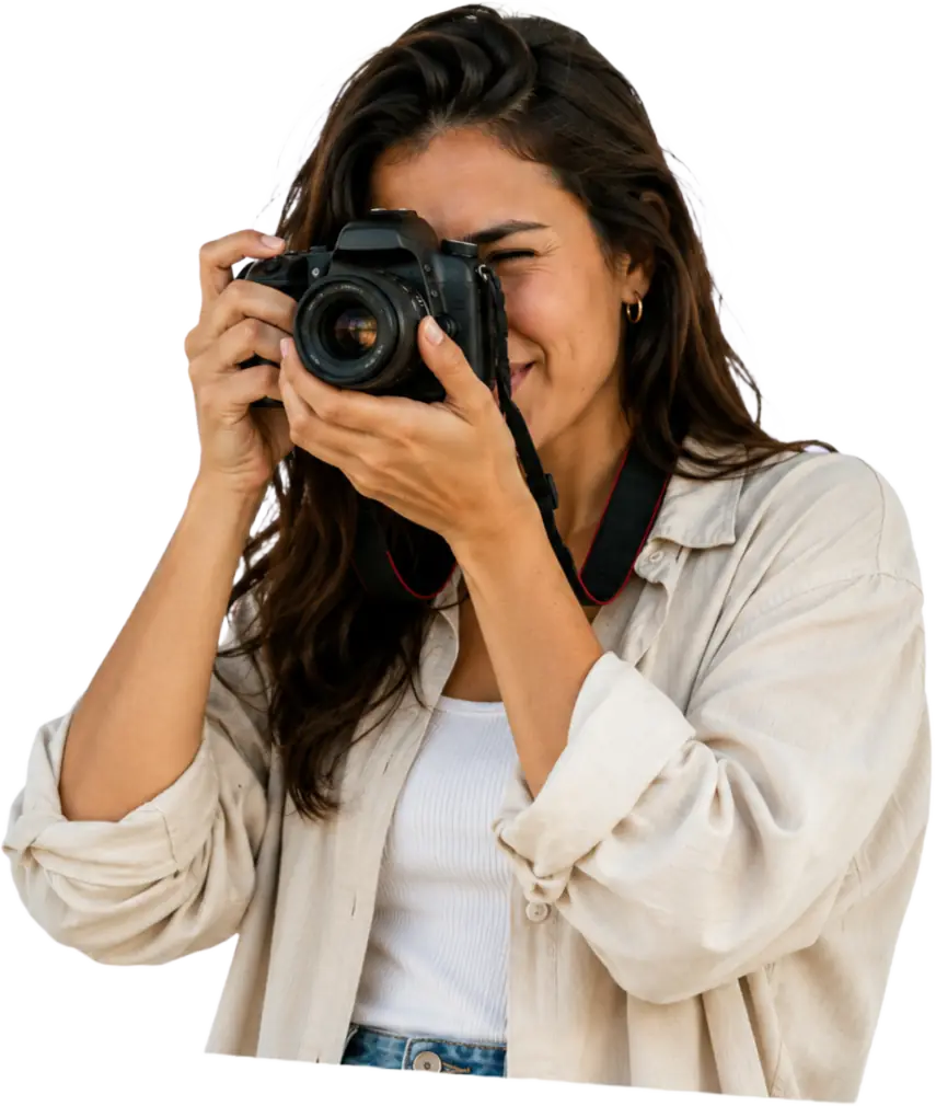 Traveller taking a photo with an analog camera